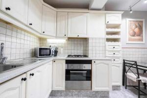 Kuchyňa alebo kuchynka v ubytovaní Apartamento Gallo Rojo