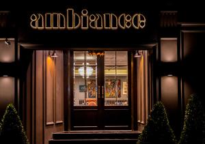 a sign on the front of an entrance to an animal pharmacy at Ambiance Boutique Art Hotel Lahore in Lahore