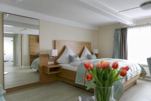 Voodi või voodid majutusasutuse Hotel Neuwarft Altbau toas