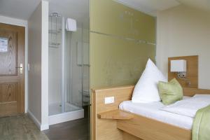Voodi või voodid majutusasutuse Hotel Neuwarft Altbau toas