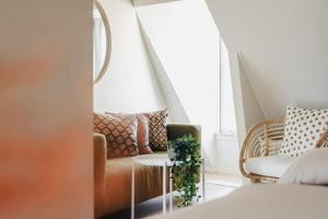 Postel nebo postele na pokoji v ubytování HOLT Hotel