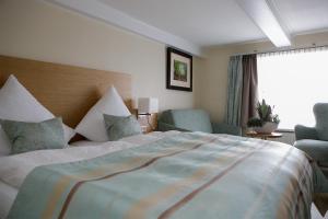 Voodi või voodid majutusasutuse Hotel Neuwarft Altbau toas