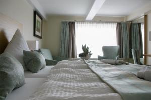 Voodi või voodid majutusasutuse Hotel Neuwarft Altbau toas