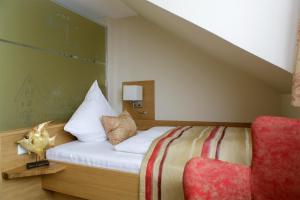Voodi või voodid majutusasutuse Hotel Neuwarft Altbau toas