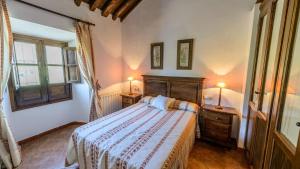 Postel nebo postele na pokoji v ubytování Huerta Nueva Cuevas del Becerro by Ruralidays + 21 fotografií