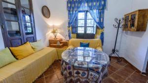 Posezení v ubytování Huerta Nueva Cuevas del Becerro by Ruralidays