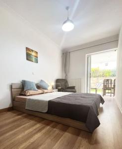 Fotografia z galérie ubytovania eva's villas 2室温馨庭院拥有私家停车位 v destinácii Glyka Nera