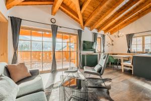 Posezení v ubytování Dachstein West Apartment T5