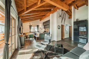 Posezení v ubytování Dachstein West Apartment T5
