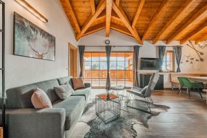 Posezení v ubytování Dachstein West Apartment T5
