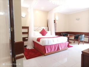 Meru Slopes Hotel客房内的一张或多张床位
