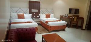 Meru Slopes Hotel客房内的一张或多张床位