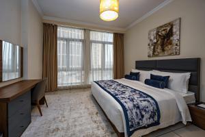 เตียงในห้องที่ Al Gassar Resort