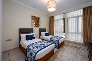 เตียงในห้องที่ Al Gassar Resort