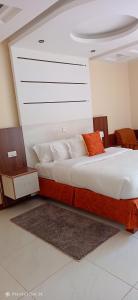 Meru Slopes Hotel客房内的一张或多张床位