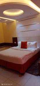 Meru Slopes Hotel客房内的一张或多张床位