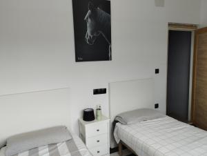 Postel nebo postele na pokoji v ubytování Alarpe Aterpetxea BSS00035