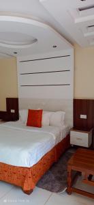 Meru Slopes Hotel客房内的一张或多张床位