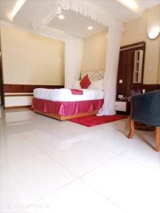 Meru Slopes Hotel客房内的一张或多张床位