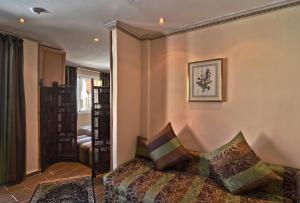 Postel nebo postele na pokoji v ubytování Résidence Ifrane Palace