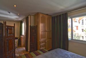 Postel nebo postele na pokoji v ubytování Résidence Ifrane Palace