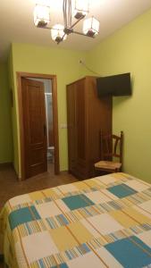 Postel nebo postele na pokoji v ubytování Posada La Reja