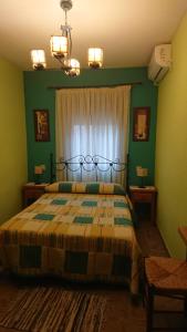 Postel nebo postele na pokoji v ubytování Posada La Reja