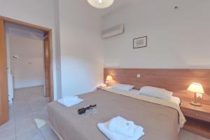 Posteľ alebo postele v izbe v ubytovaní Marirena Hotel