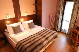 Postel nebo postele na pokoji v ubytování HOTEL SPORTING