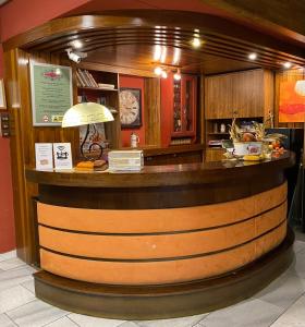 a bar in a restaurant with a counter at Formanka Hotel & Camp in Hustopeče