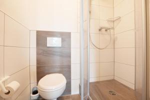Koupelna v ubytování Jugendherberge Büsum + 30 fotografií