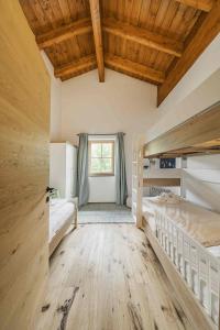 Postel nebo postele na pokoji v ubytování Dachstein West Apartment T4