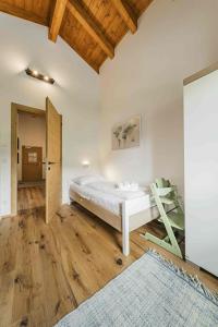 Postel nebo postele na pokoji v ubytování Dachstein West Apartment T4