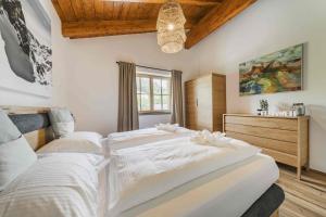 Postel nebo postele na pokoji v ubytování Dachstein West Apartment T4