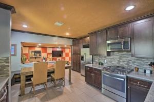 a kitchen with a table and chairs and a stove at Eclectic Houston Home Less Than 4 Mi to Downtown! in Houston