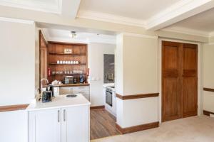 Kuchyň nebo kuchyňský kout v ubytování Lorimer Apartment