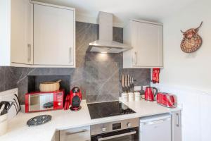Kuchyň nebo kuchyňský kout v ubytování MacLeary Apartment