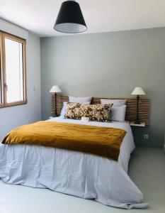 Posteľ alebo postele v izbe v ubytovaní Superbe appartement avec jardin clos