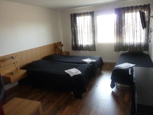 Katil atau katil-katil dalam bilik di Sure Hotel by Best Western Lagan