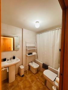Ένα μπάνιο στο Apartamento Lozano