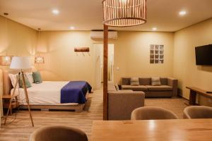 Postel nebo postele na pokoji v ubytování Hotel Neptuno