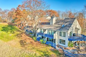 an aerial view of a house with blue trim at Bellaire Resort Condo Ski, Tube, Explore! in Bellaire