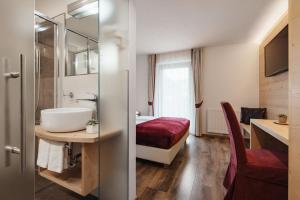 Vannituba majutusasutuses Hotel Pradat
