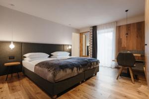 Voodi või voodid majutusasutuse Hotel Pradat toas