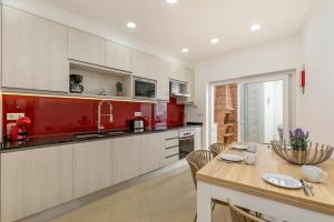 Køkken eller tekøkken på Casa da Alegria