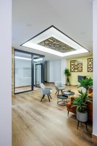 Posezení v ubytování Apartamentos Congreso, Parking gratuito