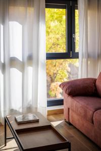 Posezení v ubytování Apartamentos Congreso, Parking gratuito