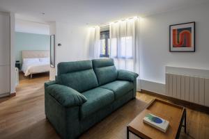 Posezení v ubytování Apartamentos Congreso, Parking gratuito