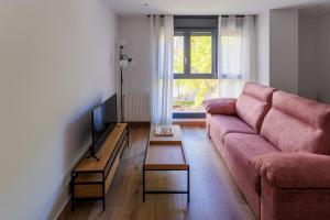 Posezení v ubytování Apartamentos Congreso, Parking gratuito