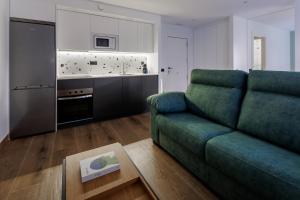 Kuchyň nebo kuchyňský kout v ubytování Apartamentos Congreso, Parking gratuito